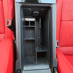 Complete Appearance Camry general storage area holds wallets and IDs safely.