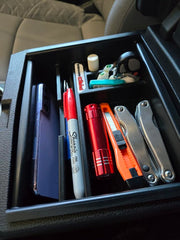 Complete Appearance Tacoma tray earbud box keeps cords tidy and accessible.