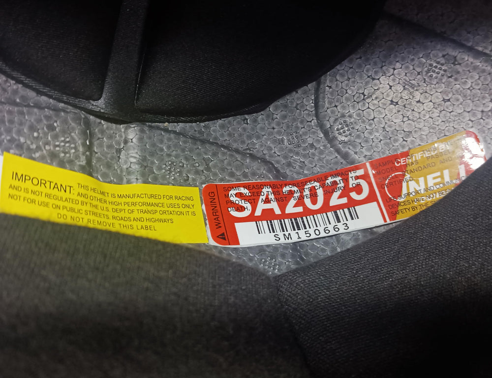 Conquer Snell SA2025 Kevlar chin strap detail supports secure durable fastening