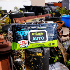 Crocodile Cloth Auto Cleaning Wipes dispensing from pack for quick cleaning.