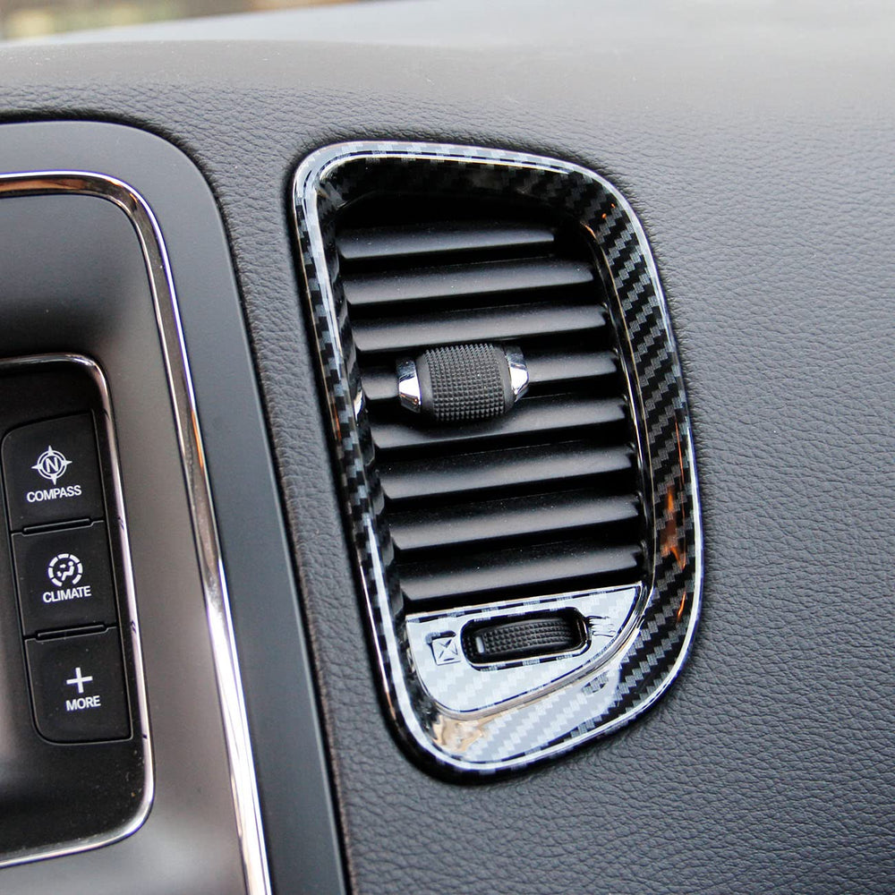 Crosselec carbon-fiber-look dash ornament for Durango improves cabin aesthetics.