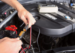 CTEK Comfort Indicator Clamps attached to a charger in use.