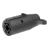 CURT 57260 adapter close-up shows 7-Way blade to 6-Way round connection for easy towing.