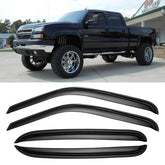 Cxdar window rain guards on Silverado front view showing protective deflection