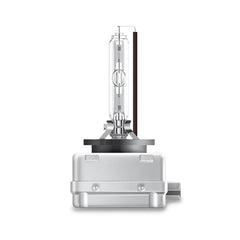 DAMA D1S HID headlight bulb during installation on a dark road