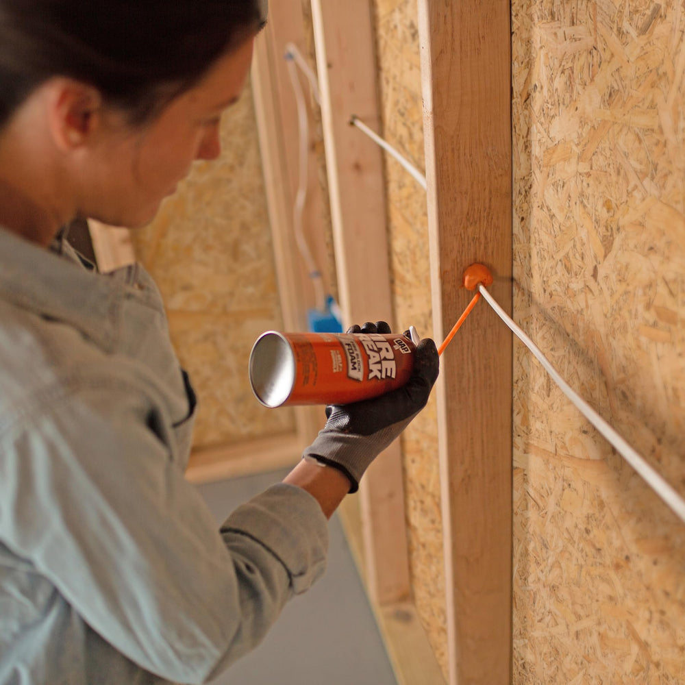 DAP FireBreak application in gaps shows sealing drafts and reducing air infiltration