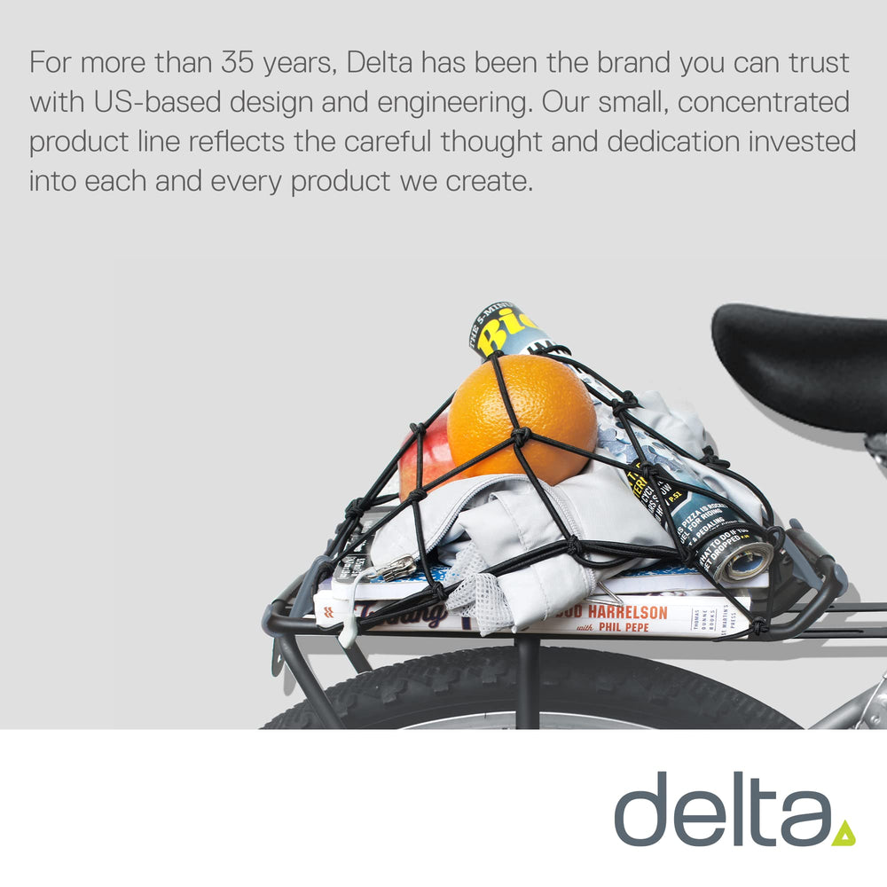 Delta Small Cargo Net securely holds a motorcycle helmet during rides.