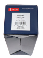 Denso 673-2301 brand stamp on coil housing signals quality and authenticity.