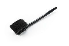 Detail Factory soft-bristle brush lifts dirt without scratching surfaces.