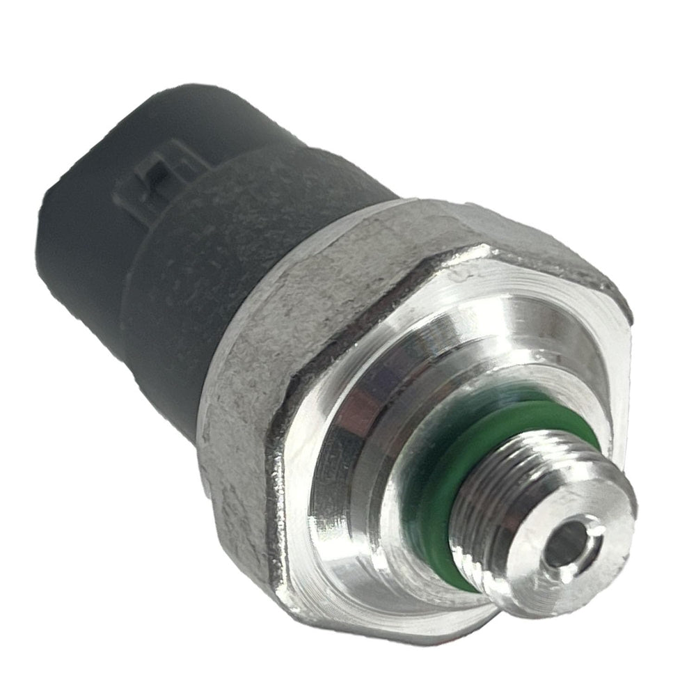DEVMO A/C pressure switch terminals close-up reveals durable connectors for reliable signaling.