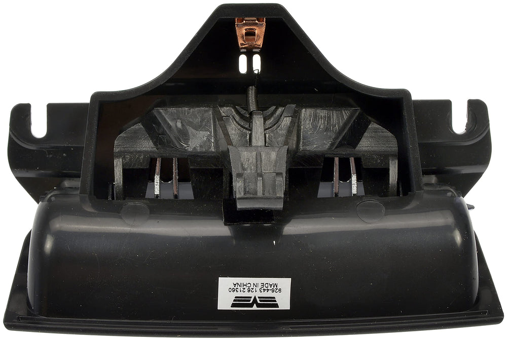 Dorman center console latch in hand shows installation-ready part.