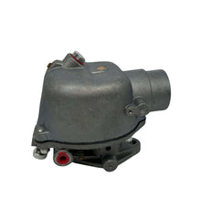Dosens carburetor installed on tractor demonstrating simple mounting.