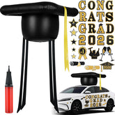 Draupnir graduation cap inflates on car roof for a festive celebration.