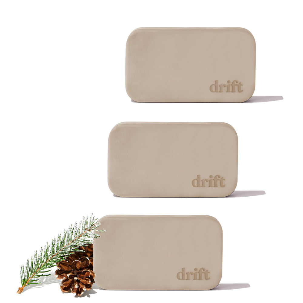 Drift car air freshener wood block attaches to visor for long-lasting pine scent.
