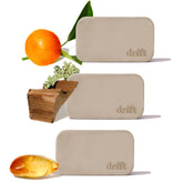 Drift teak stone car air freshener on visor delivers long-lasting, subtle aroma.