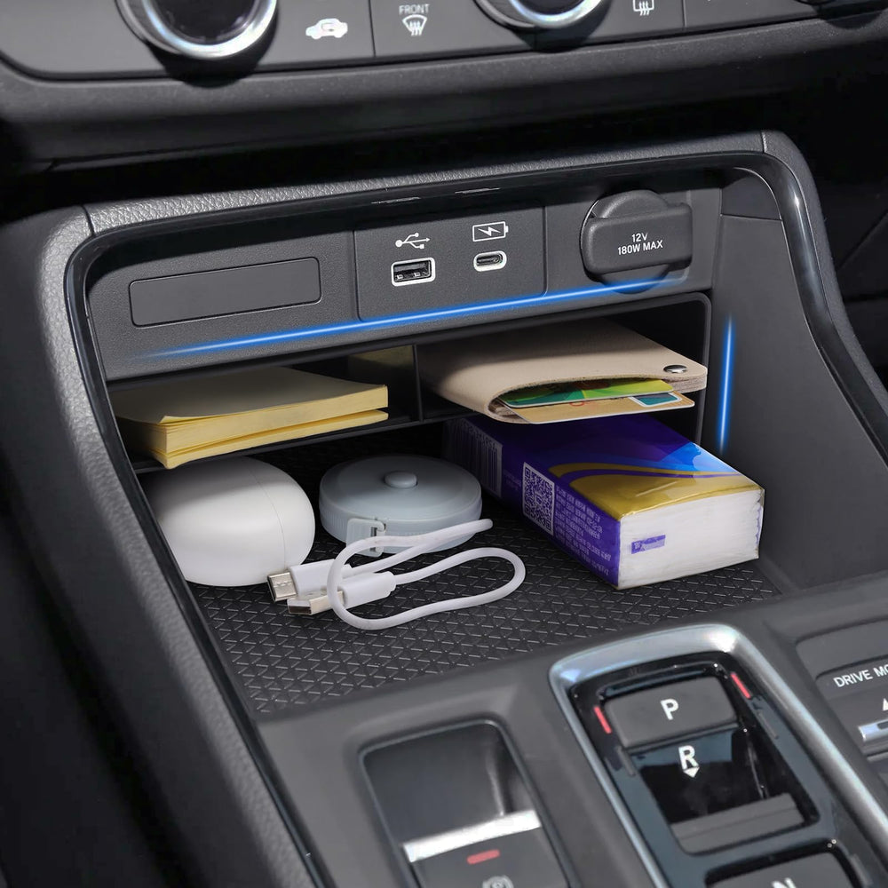 Drytuns CR-V center-console cable pass-through for easy charging