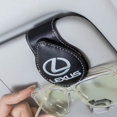 DSVI sunglasses holder clip closeup showing durable leather and secure grip.