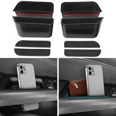 DWKJMYCP door side storage box front left keeps phone and keys within easy reach.