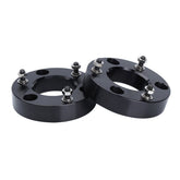 Dynofit Silverado 2in leveling front spacers raise the front end for better stance.