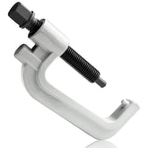 Dynofit torsion bar unloading tool mounted on a Silverado for safe suspension work