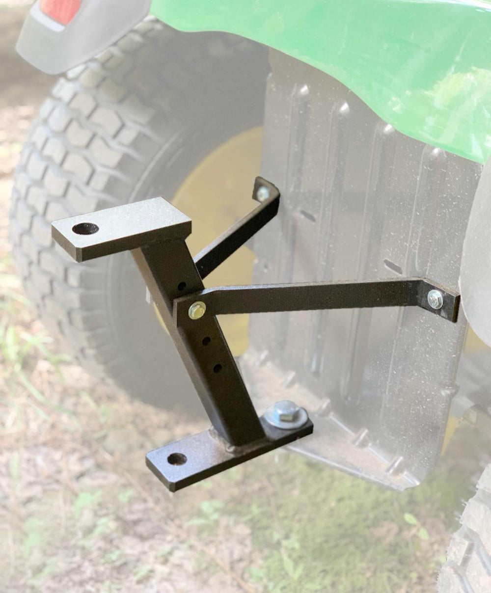 Eapele trailer hitch on a lawnmower during assembly for easy towing