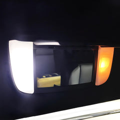 Easy Eagle license plate light for Tacoma boosts night visibility behind.