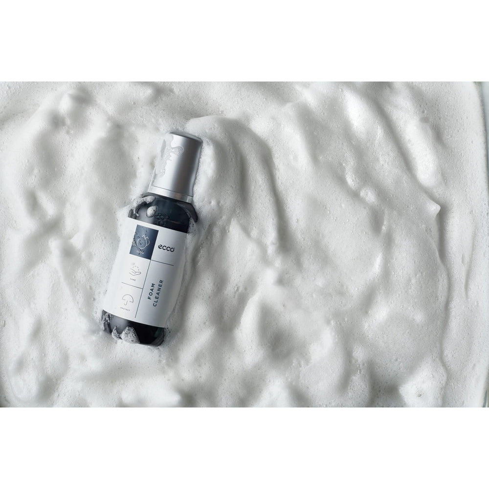 ECCO Foam Cleaner foam application demonstrates self-foaming action lifting grime from uppers.