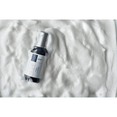ECCO Foam Cleaner foam application demonstrates self-foaming action lifting grime from uppers.