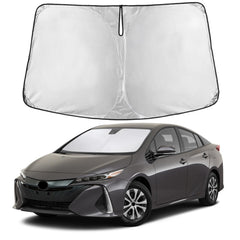 EcoNour windshield shade folded on Prius hatchback, showing compact storage option