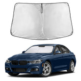 EcoNour Windshield Sunshade on BMW 3 Series; front view installed reduces glare and heat.