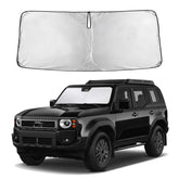 EcoNour windshield sunshade full-coverage view protects the Land Cruiser interior from sun glare
