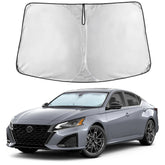 EcoNour windshield sunshade on Nissan Altima front view blocks heat and keeps the cabin cooler.