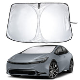 EcoNour windshield sunshade for Prius hatchback front view blocks heat and glare.