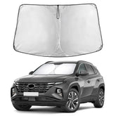 EcoNour windshield sunshade for Tucson 2022–2026, front view showing full coverage and glare reduction