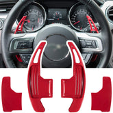E-cowlboy extended red shifter paddle front view enhances Mustang interior.