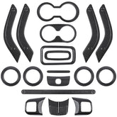 E-cowlboy dashboard trim in gloss carbon fiber enhances Wrangler JK interior.