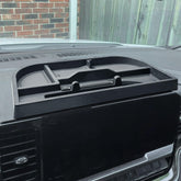 EDBETOS center-console organizer behind 13.4-inch display keeps essentials within reach.