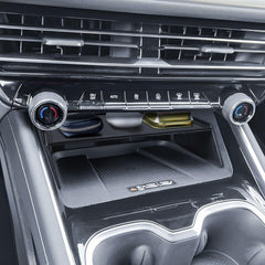 Compact cubby design maximizes unused console space