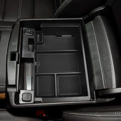 Lower storage hides valuables in a discreet, accessible compartment.