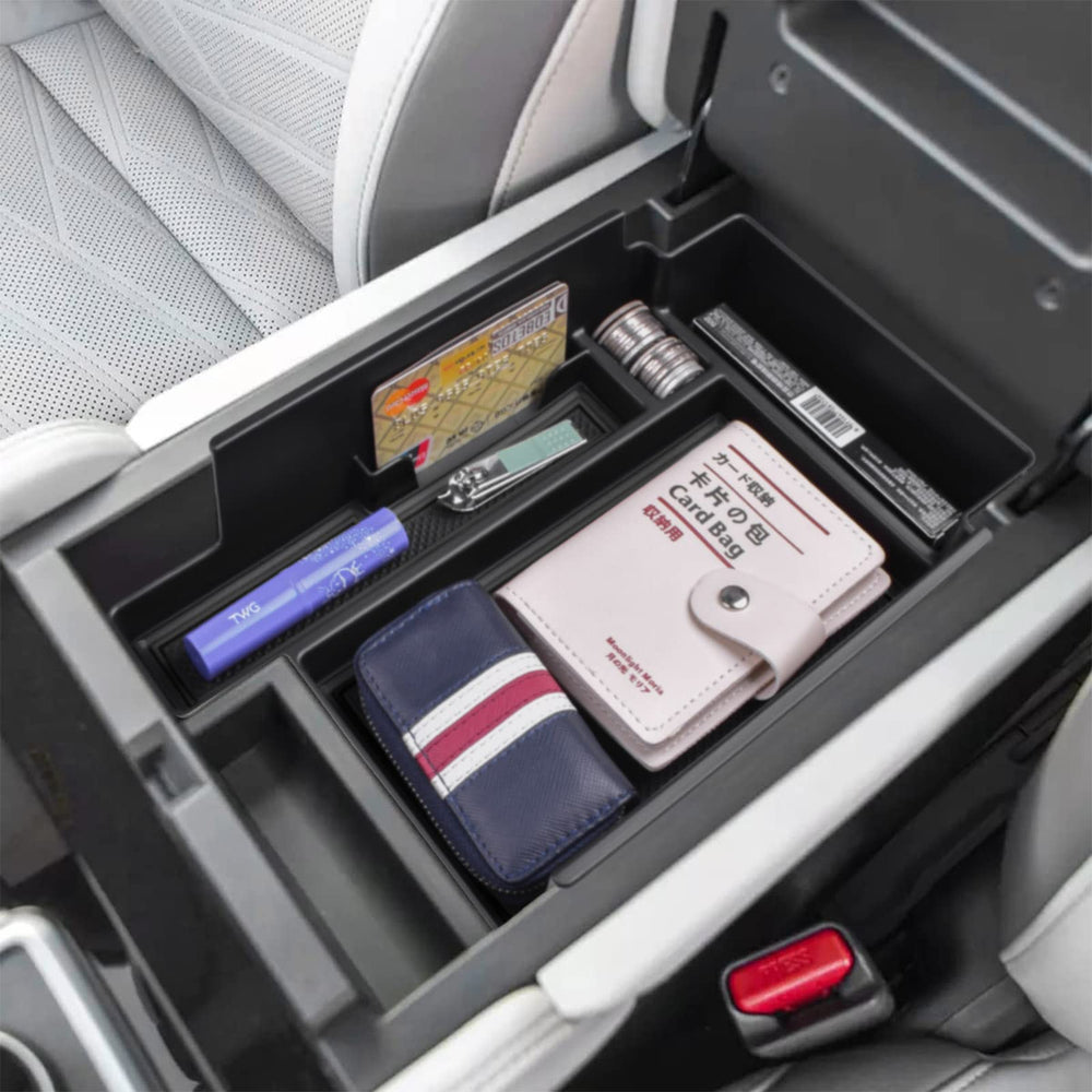 EDBETOS Pathfinder center console tray interior view showing organization