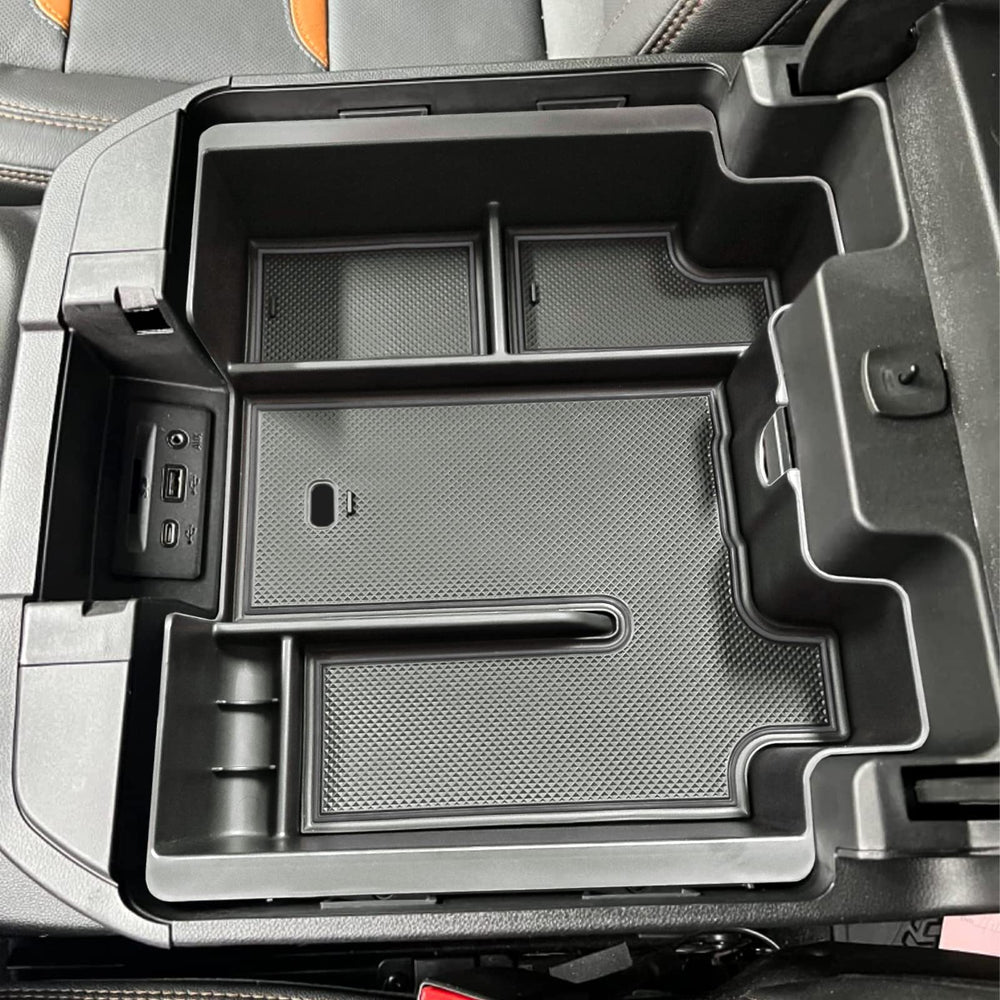 EDBETOS USB charging hole and back panel access in Silverado console tray