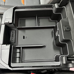 EDBETOS USB charging hole and back panel access in Silverado console tray