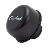 Edelbrock EDL4403 Pro-Flo black round breather, top view, blends with black valve covers for a cohesive engine look