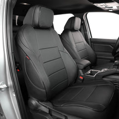 EKR Tacoma front seat covers showing leather-like texture and spill protection.