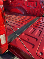 Tailgate gap sealed to block dust and water with cap or tonneau