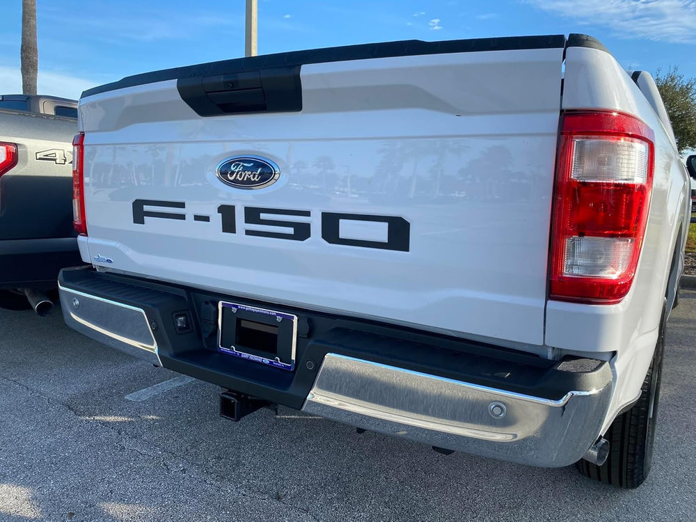 Eurosport Daytona tailgate letters on Ford F-150, bold black branding.