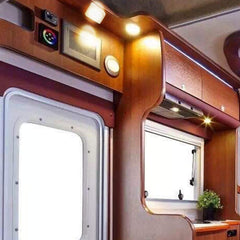 Facon Square RV motion sensor light installed in a tight cabinet with flush fit.