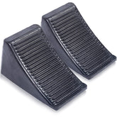 Fasmov two-pack solid rubber wheel chocks provide secure parking on uneven surfaces.
