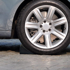 Fasmov versatile wheel chock suitable for cars, trailers, RVs, boats, and more.