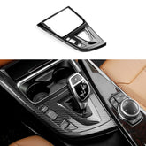 FEXIDA BMW gear shift panel cover with carbon fiber pattern enhances cabin styling